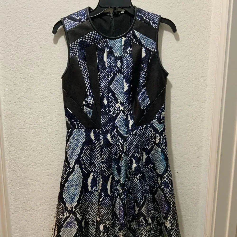 Diane von Furstenberg fashionable python women dress Size 6 100% leather trim